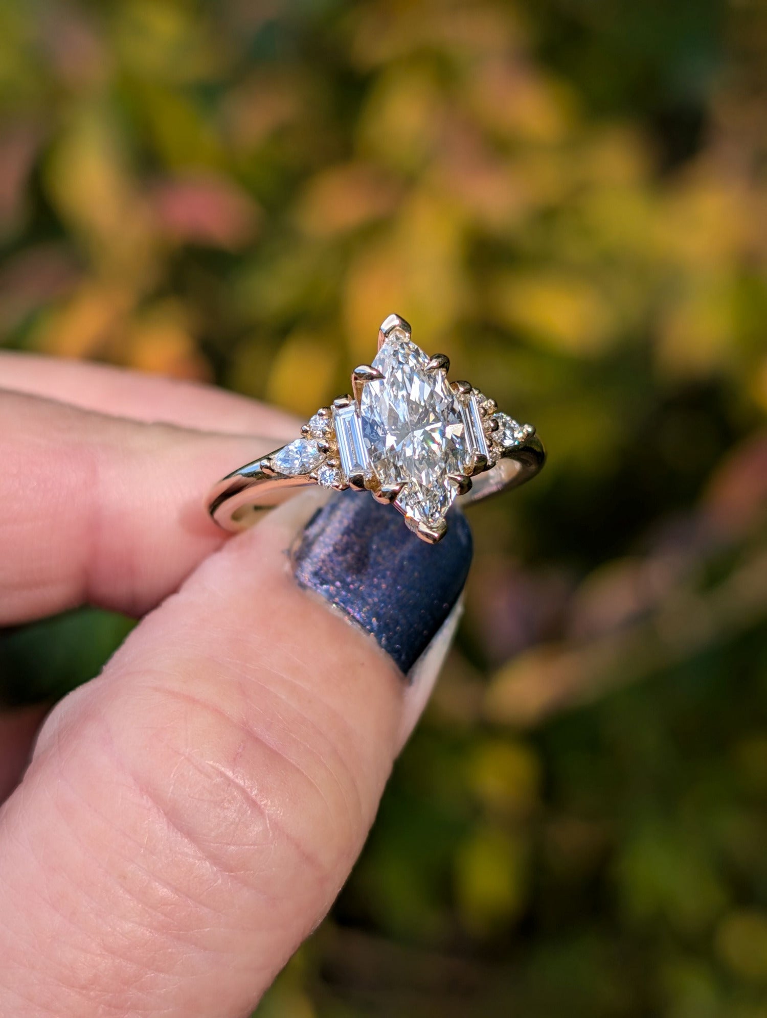 Marquise Diamond Engagement Ring with Baguette accent diamonds